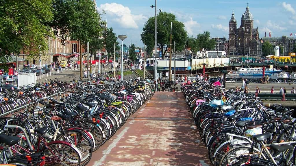 This image has an empty alt attribute; its file name is Bikes-in-a-city-e1762417974267.png